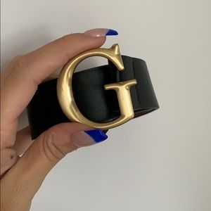 Black and gold G Guess belt